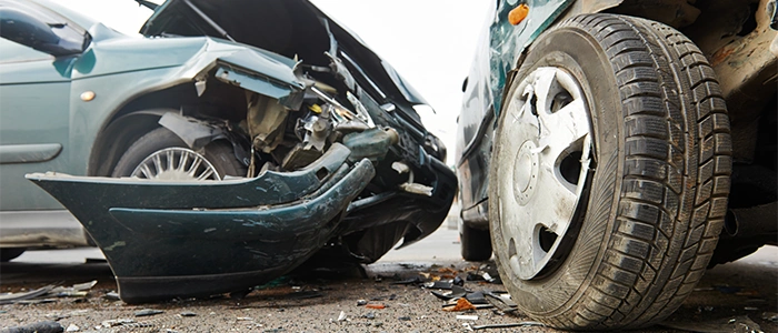 Car Accident Between Two Green Vehicles