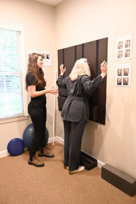 Patient Doing Rehab Exercises At Combs Chiropractic & Wellness
