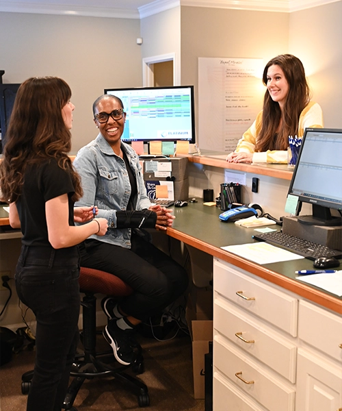 Team Members Checking In Patient